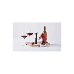 Pompe à vin + 3 bouchons Le Creuset